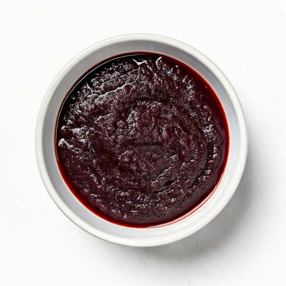 Schlehenmus Fruchtpüree
					100 % Schlehbeeren, fein passiert, 680 g
				